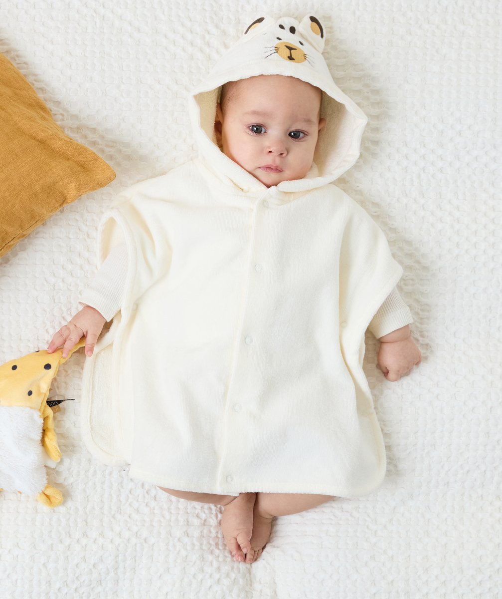 Tiger-themed hooded baby poncho in terry cloth