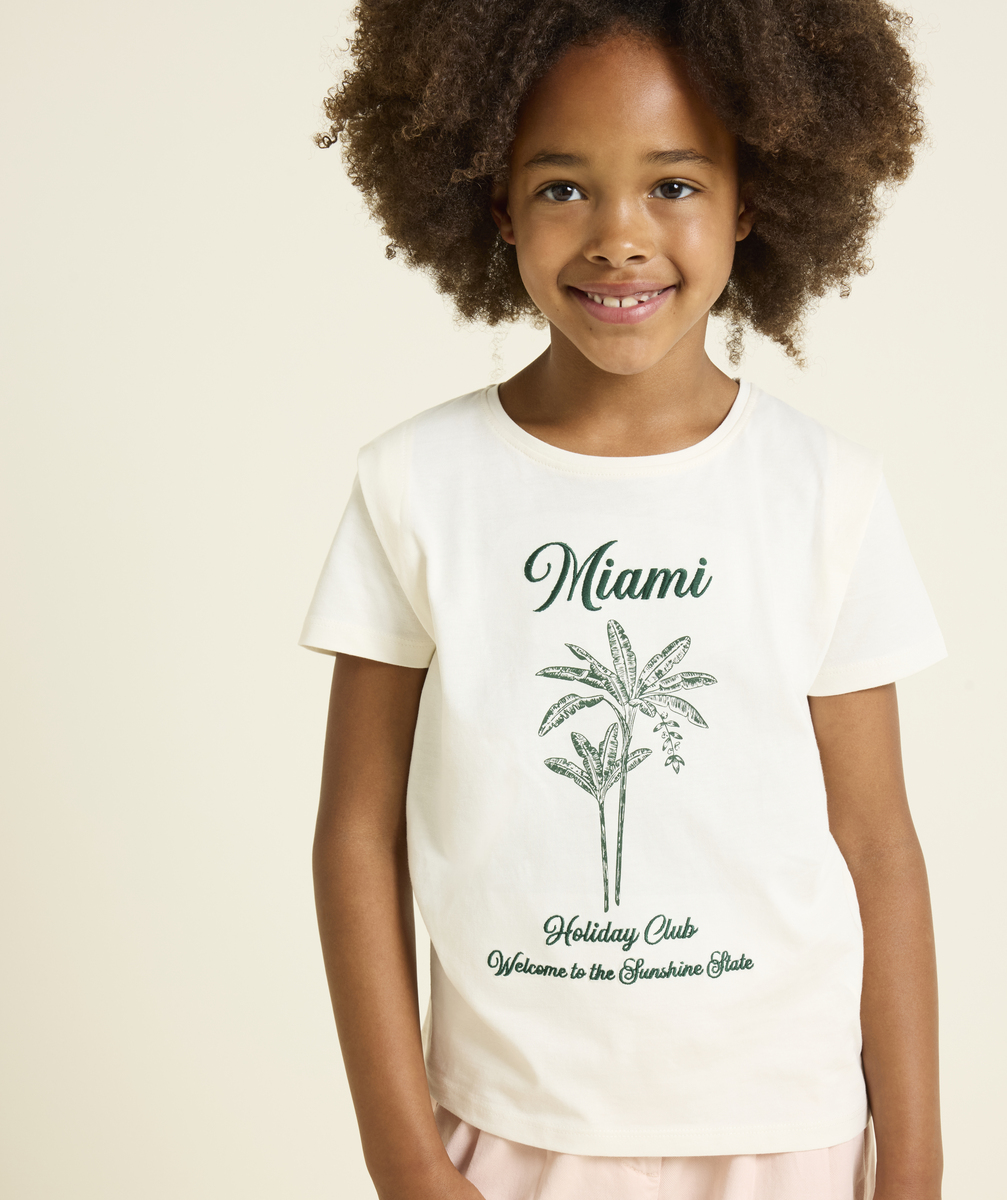 Short-sleeved organic cotton girl's t-shirt in ecru with miami print