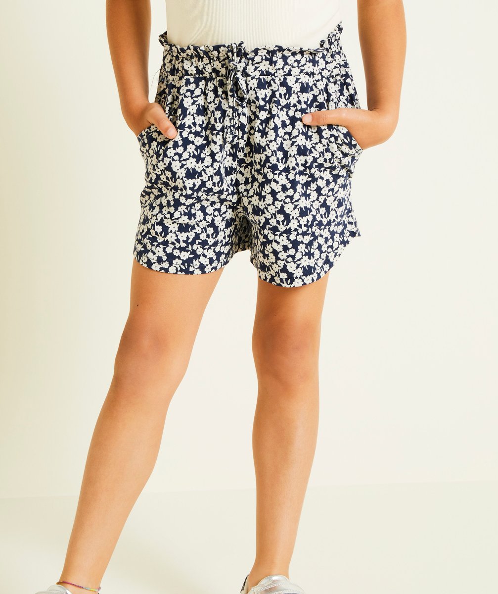 Flowing shorts for girls in navy blue organic cotton with flower print