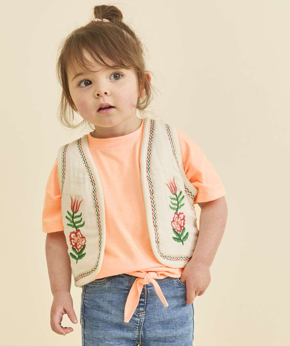 Short-sleeved neon orange baby girl t-shirt with bow