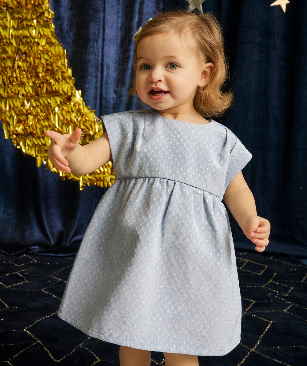 Blue baby girl dress with polka dots and short sleeves