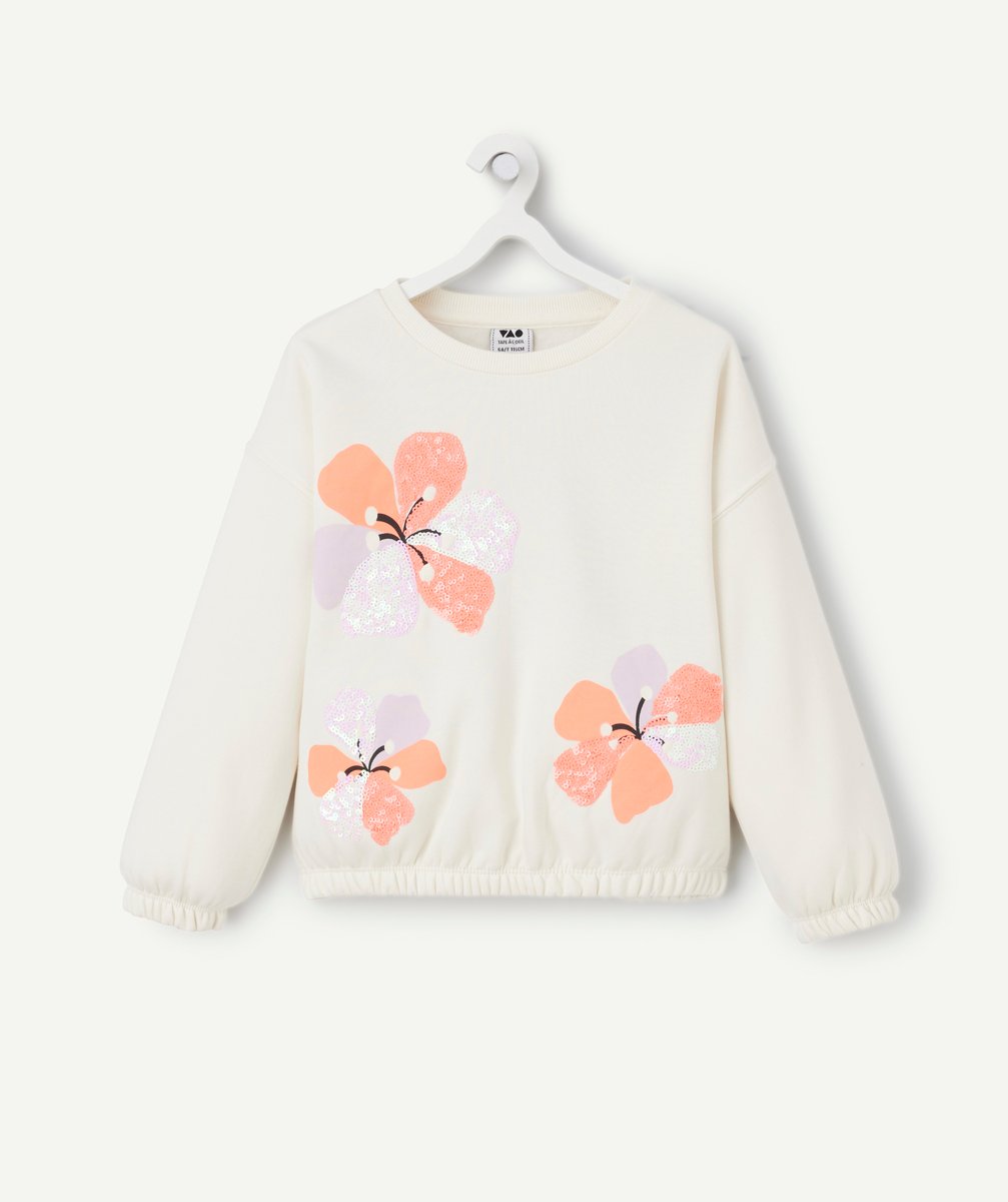 White girl's sweater with pastel flowers
