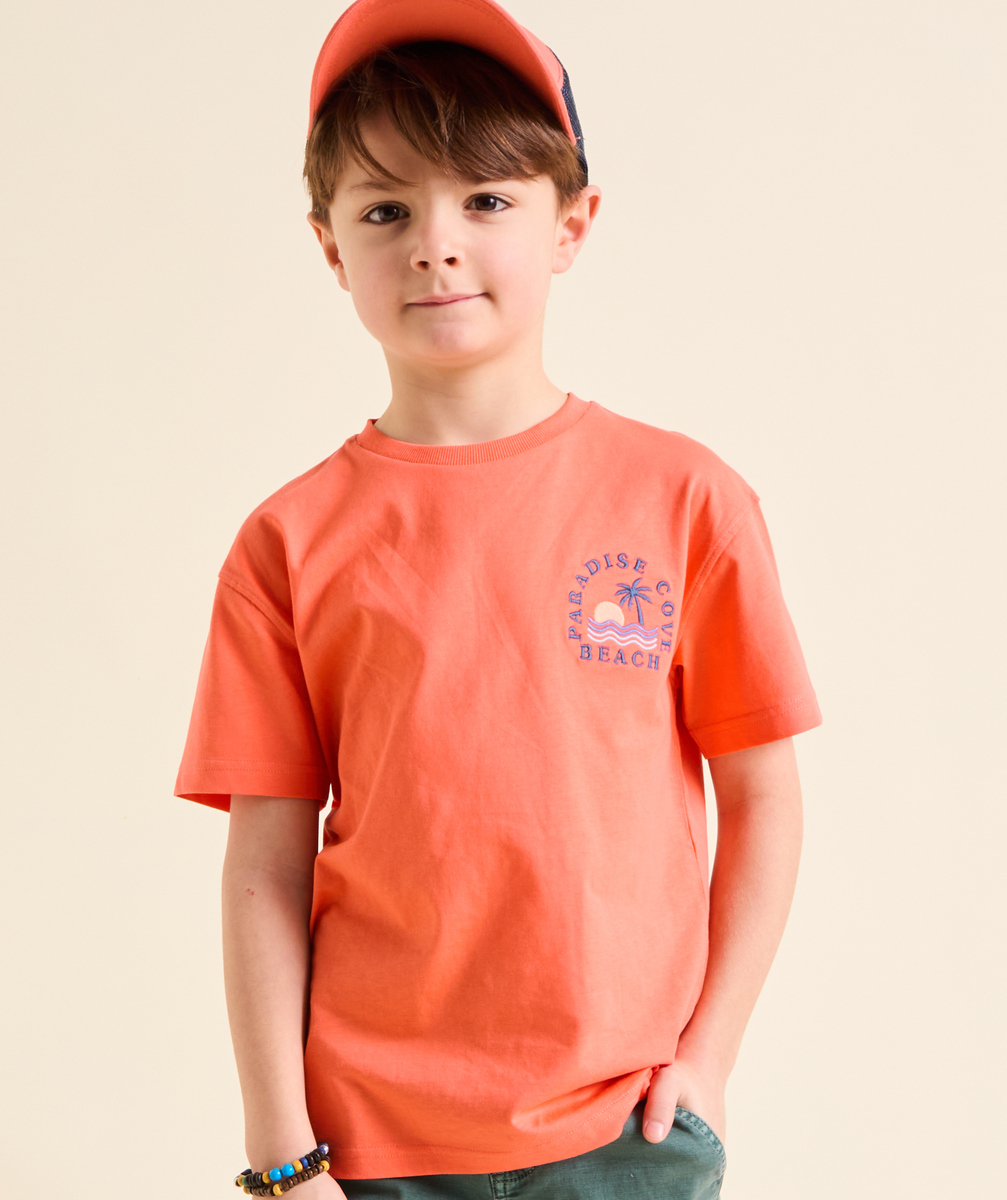 Boy's orange short-sleeved t-shirt with writing