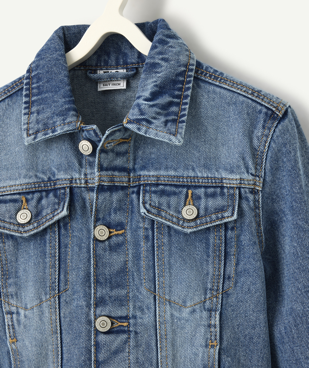 Boy's worn denim jacket