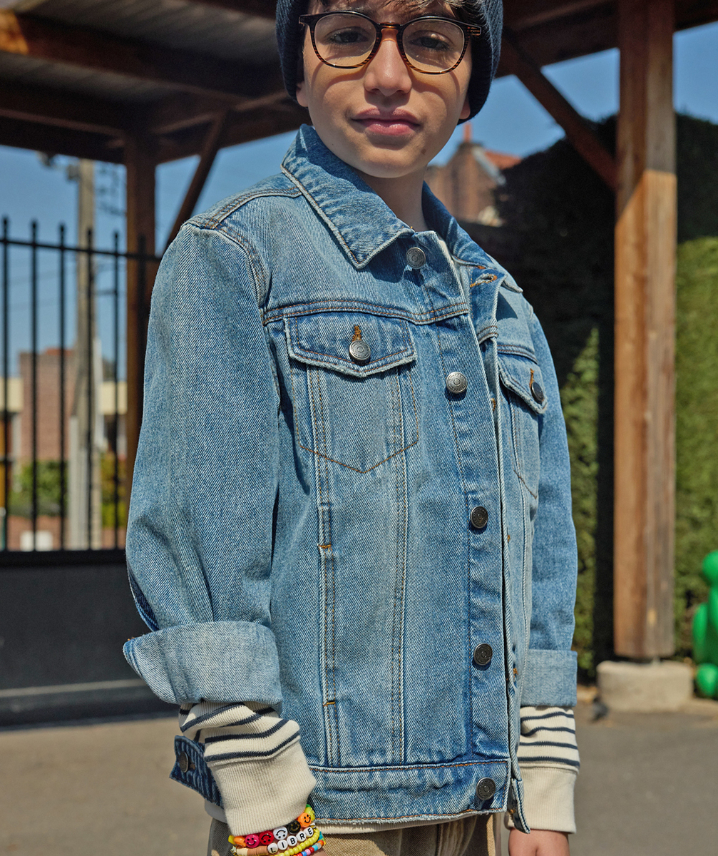 Boy's worn denim jacket