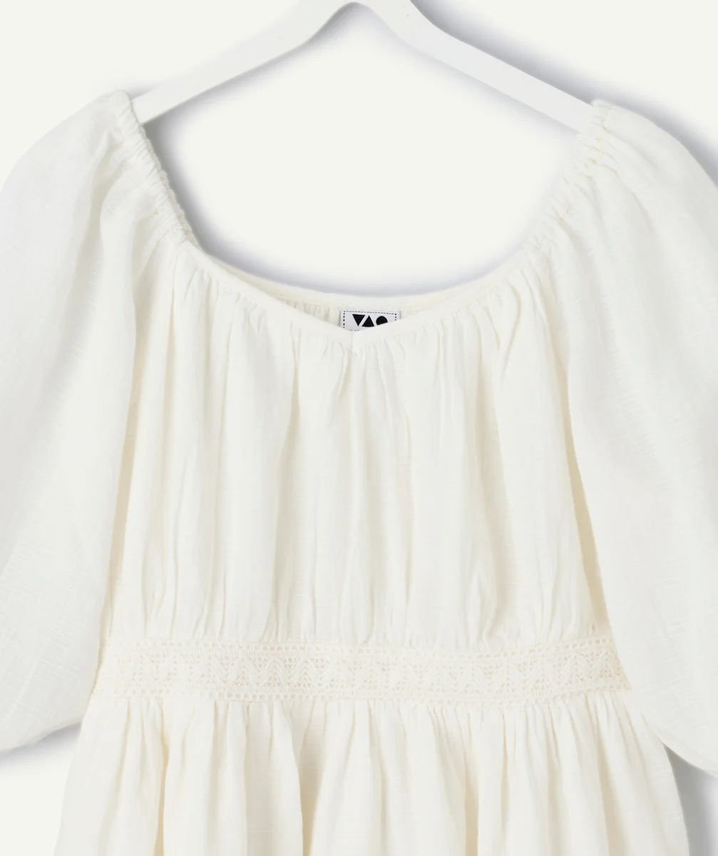 White girl's dress with puffed sleeves
